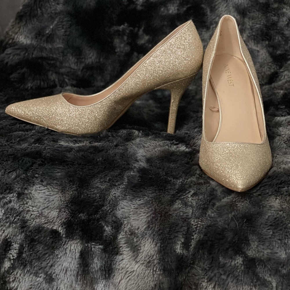 Nine West glittery gold pointy-toed pumps